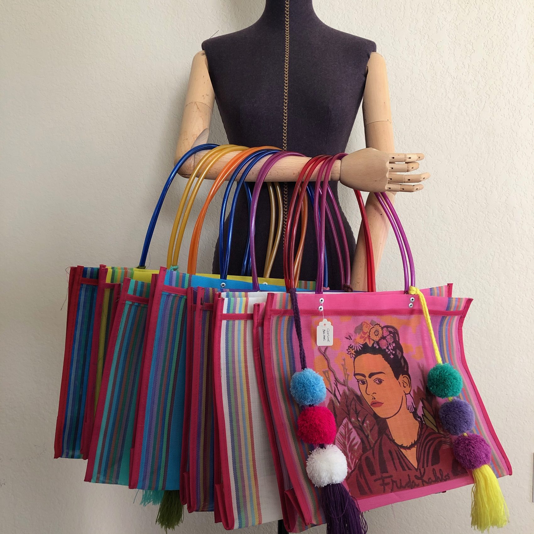 Frida Kahlo In Pink Flowers Tote Bag by Mark Ashkenazi - Fine Art America